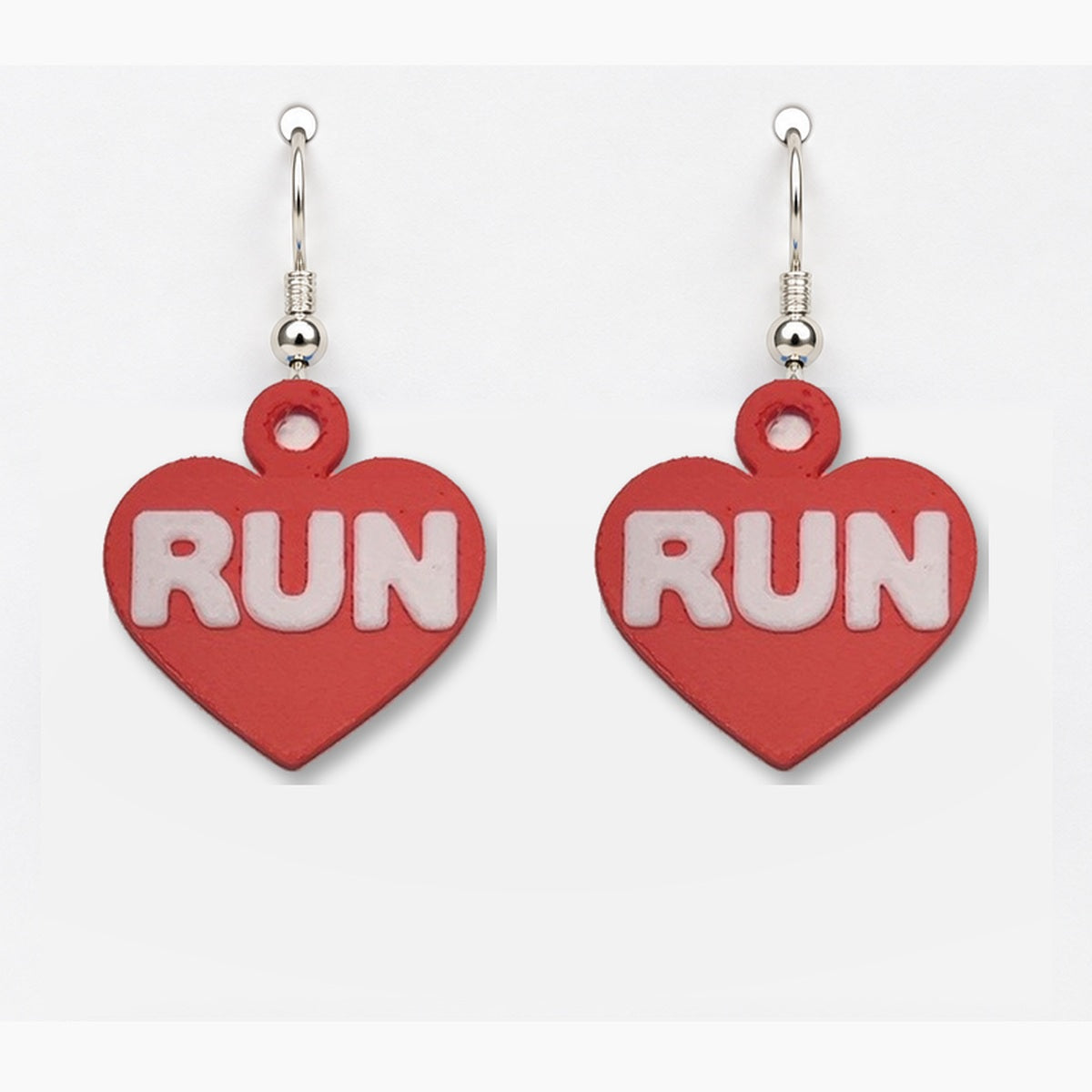 Close-up red RUN heart earring pair
