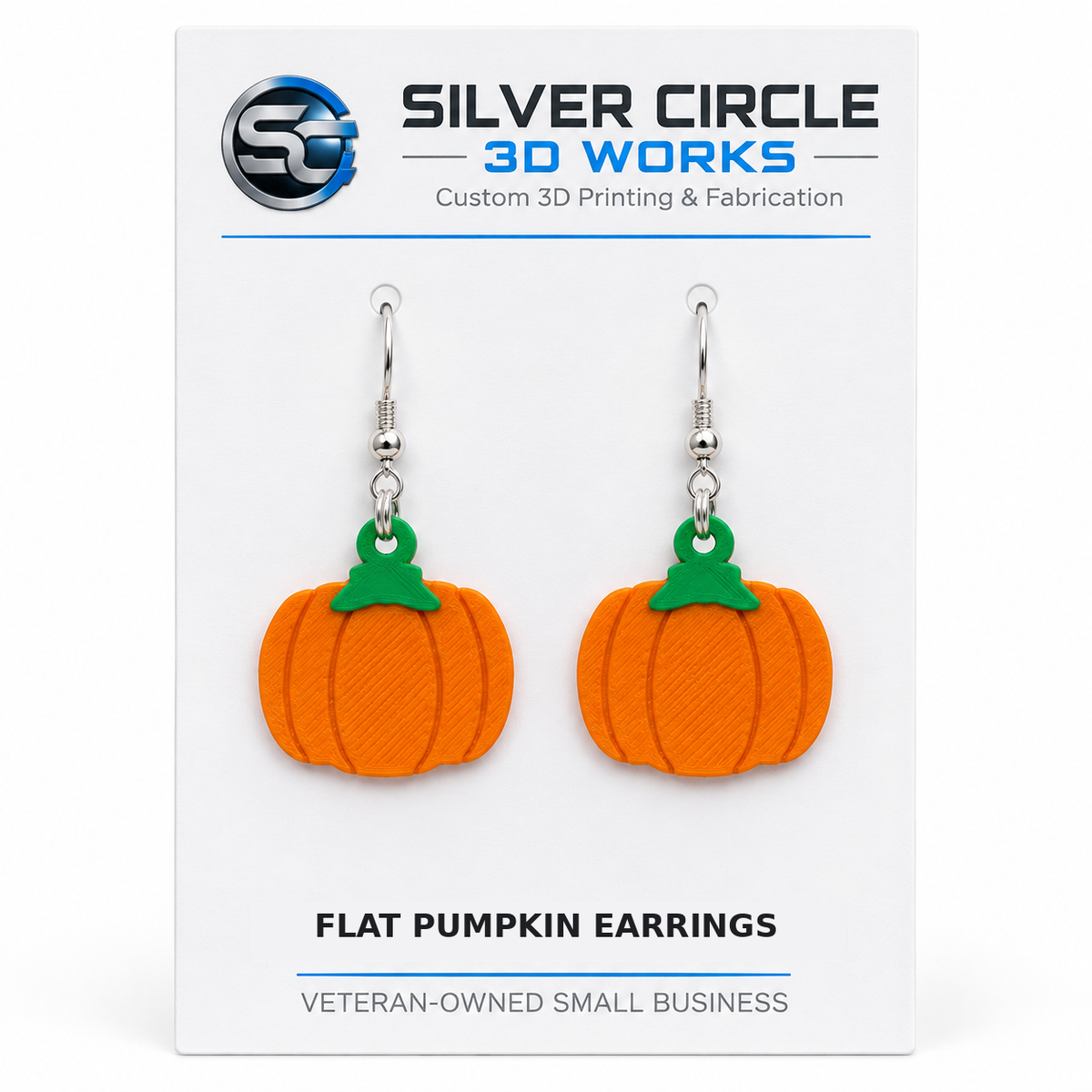 Flat pumpkin earrings on Silver Circle 3D Works backing card labeled Flat Pumpkin Earrings