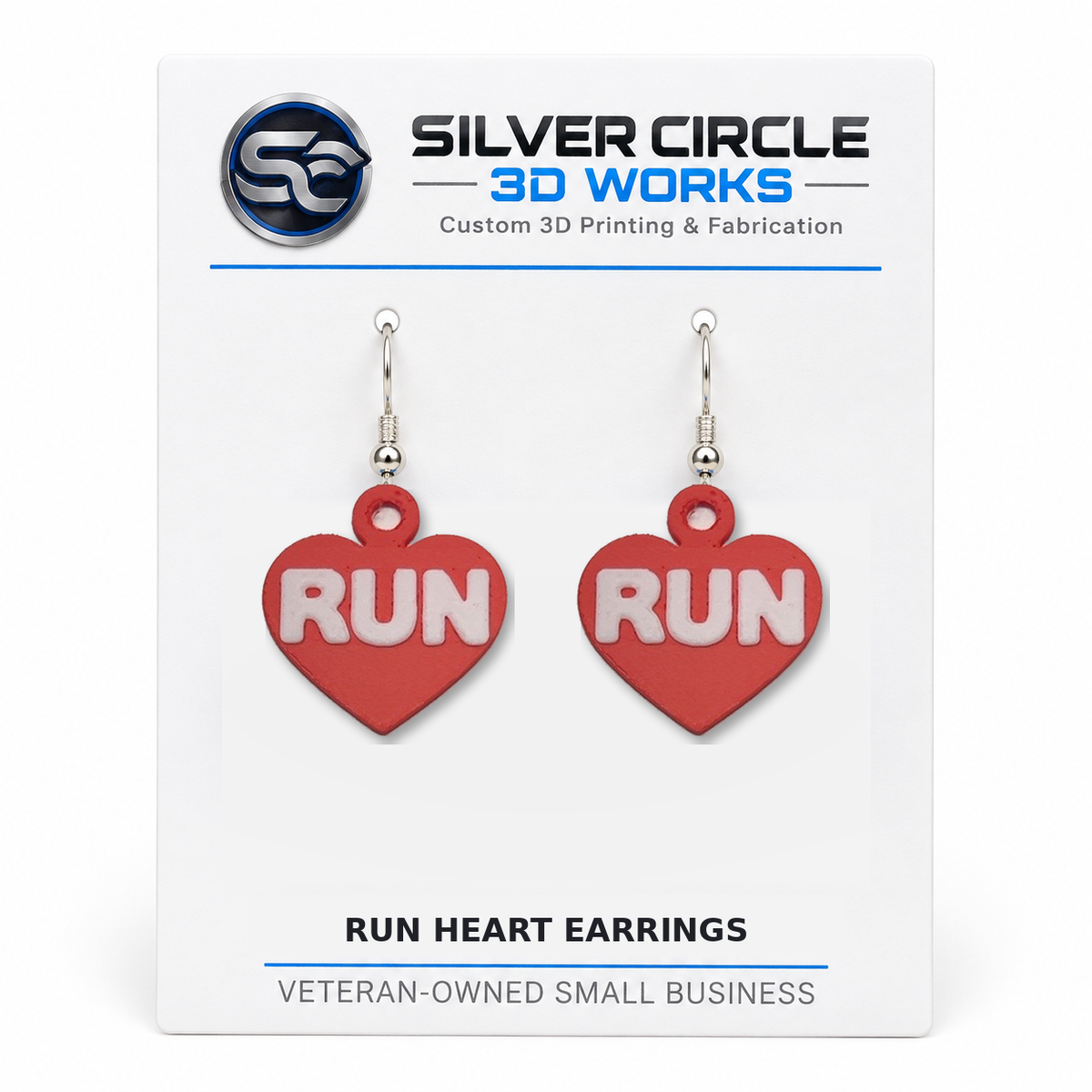 Red RUN heart earrings on branded backing card, one pair