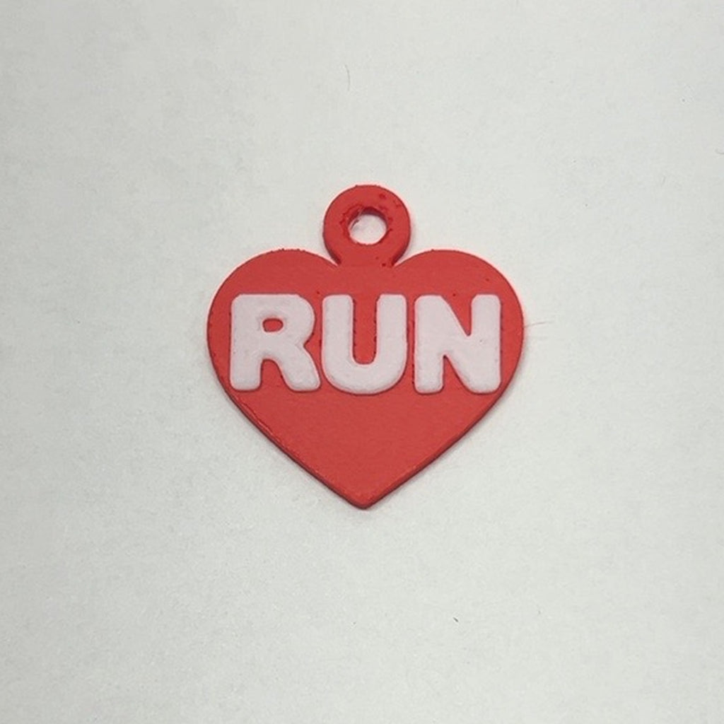 Red heart RUN earring with white lettering