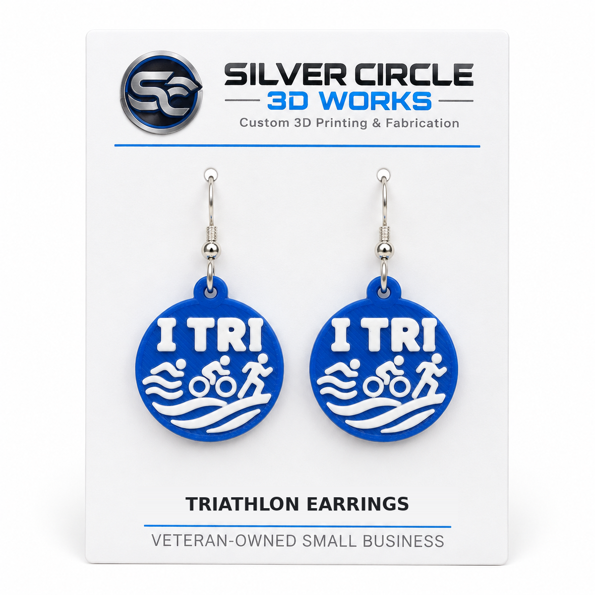 Blue TRI earrings with silver hooks mounted on Silver Circle 3D Works backing card